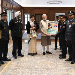 Hon'ble PM unveiling the commemorative material on the occasion of the AFFD, in New Delhi on 07.12. 2018.